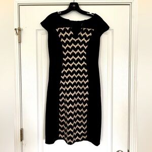 Deep purple dress with gold accents